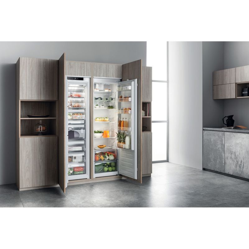 Integrated tall deals fridge and freezer